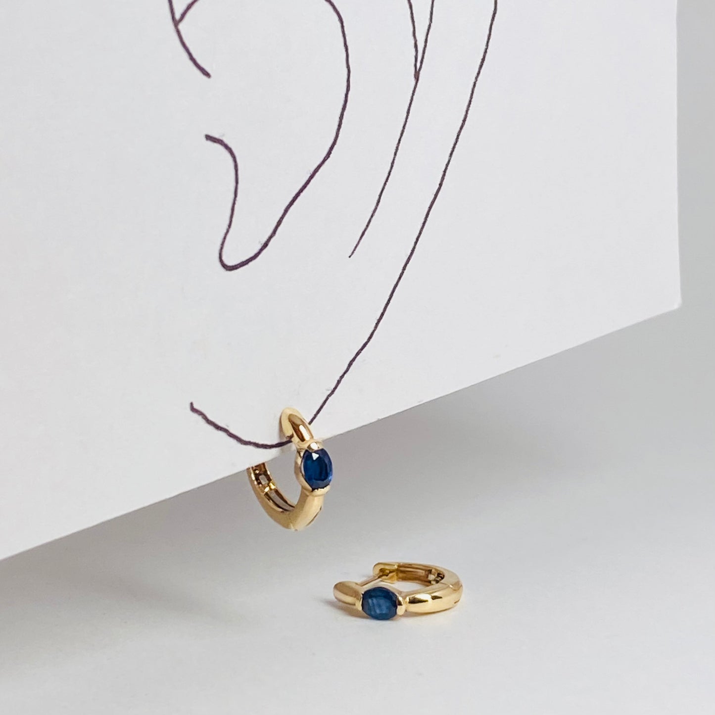 K10イエローゴールドサファイア中折れピアス