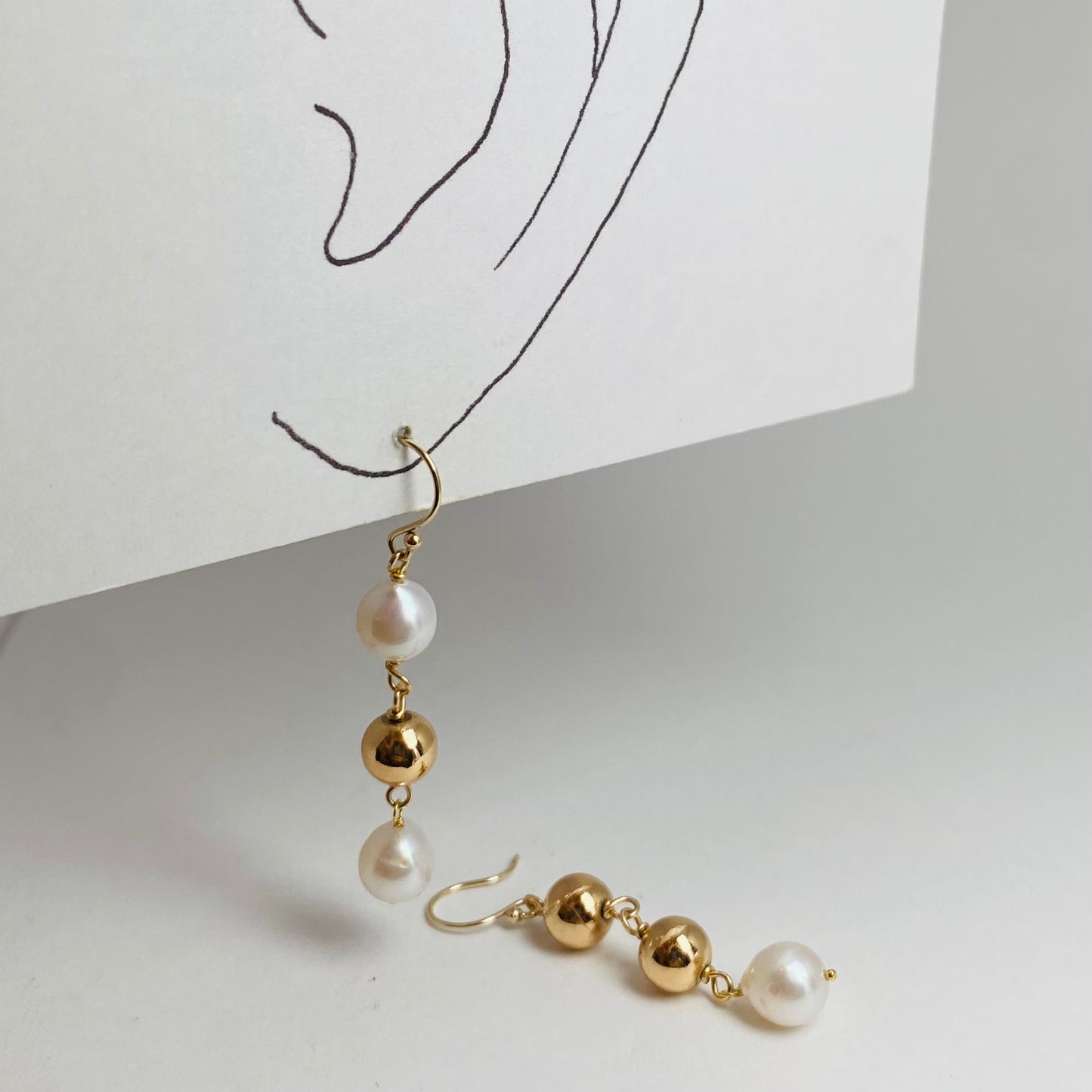 K10イエローゴールド 淡水パール・ヘマタイトピアス