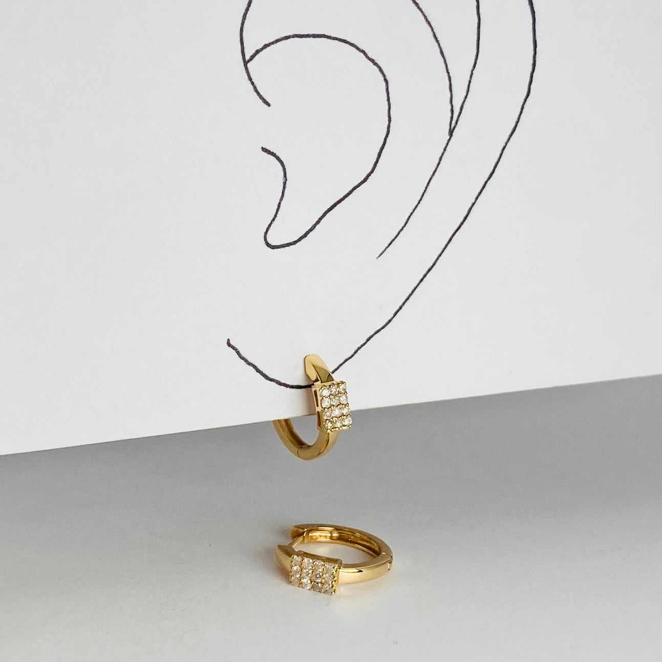 K18イエローゴールド ダイヤモンド0.2ct中折れフープピアス